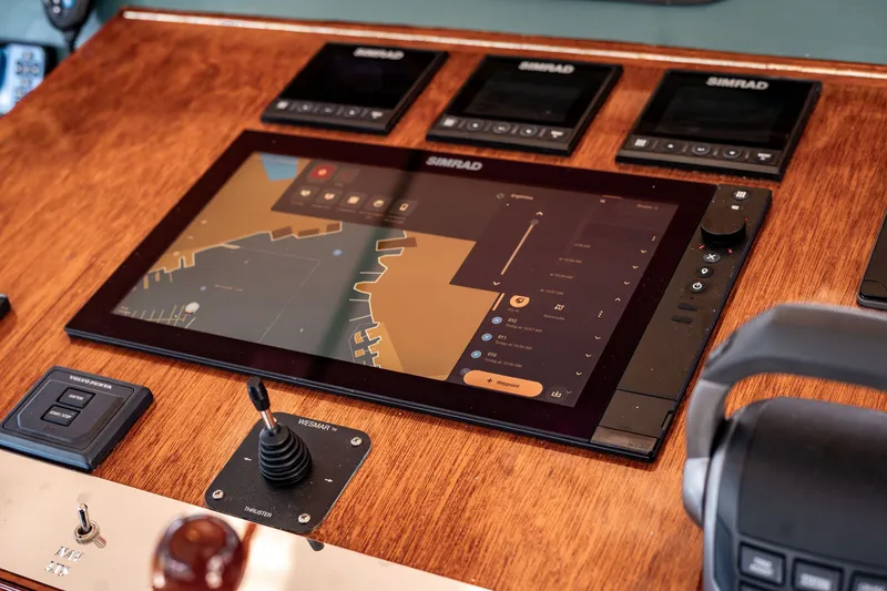 Slide: The Image of Control panel of a 1981 Thackwray Motorsailor with Simrad navigation system. - 56