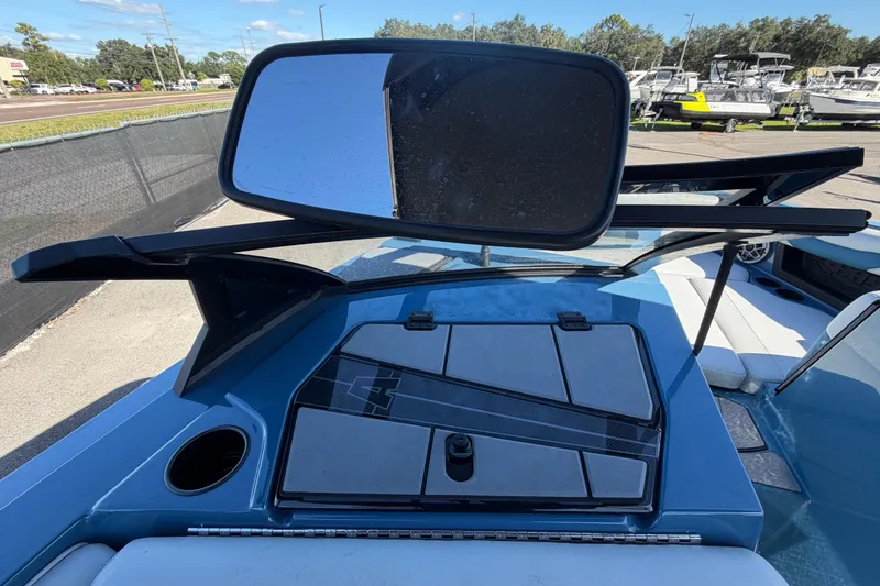 Slide: The Image of 2023 Axis T220 boat dashboard with mirror and storage compartments. - 22