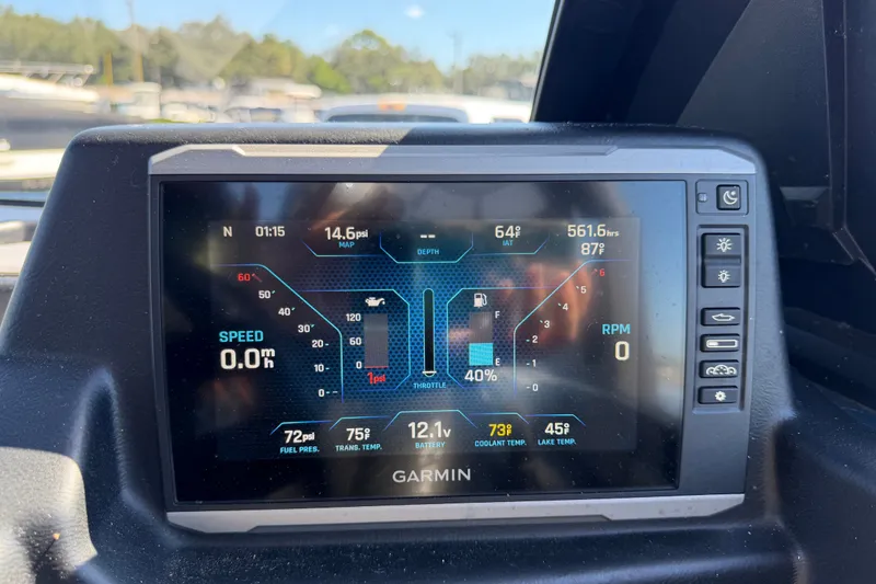 Slide: The Image of Garmin display on 2023 Axis T220 boat showing speed, RPM, and engine metrics. - 34