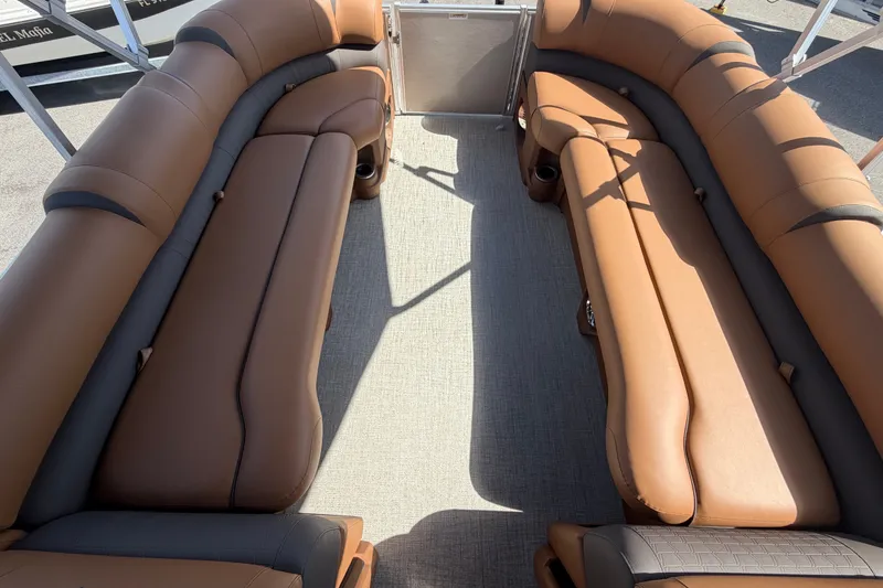 Slide: The Image of Luxurious brown seating on 2025 Avalon Excalibur LTD Quad Lounge boat. - 55