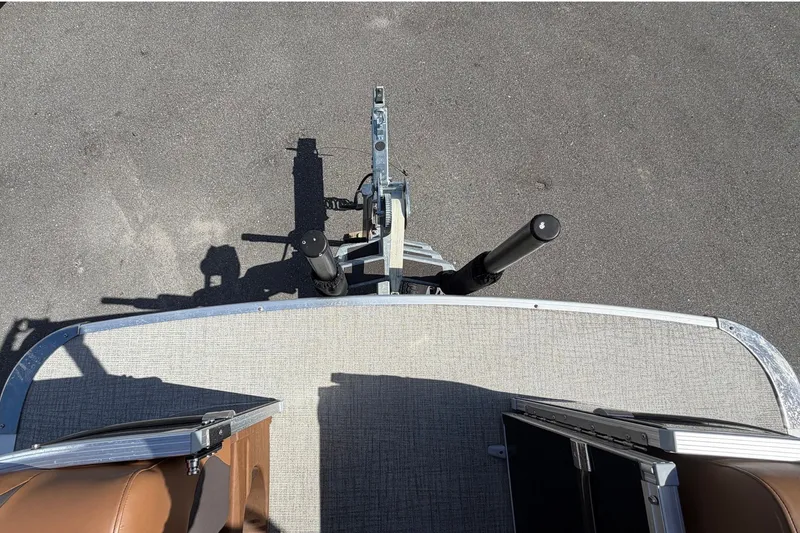Slide: The Image of Top view of 2025 Avalon Excalibur LTD Quad Lounge boat's bow and trailer hitch. - 66