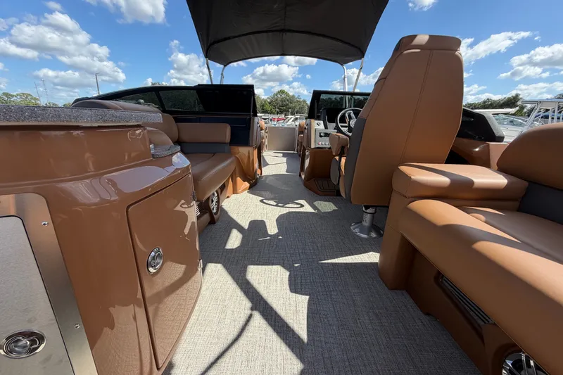 Slide: The Image of 2025 Avalon Excalibur LTD Quad Lounge boat interior with luxurious seating and modern design. - 30
