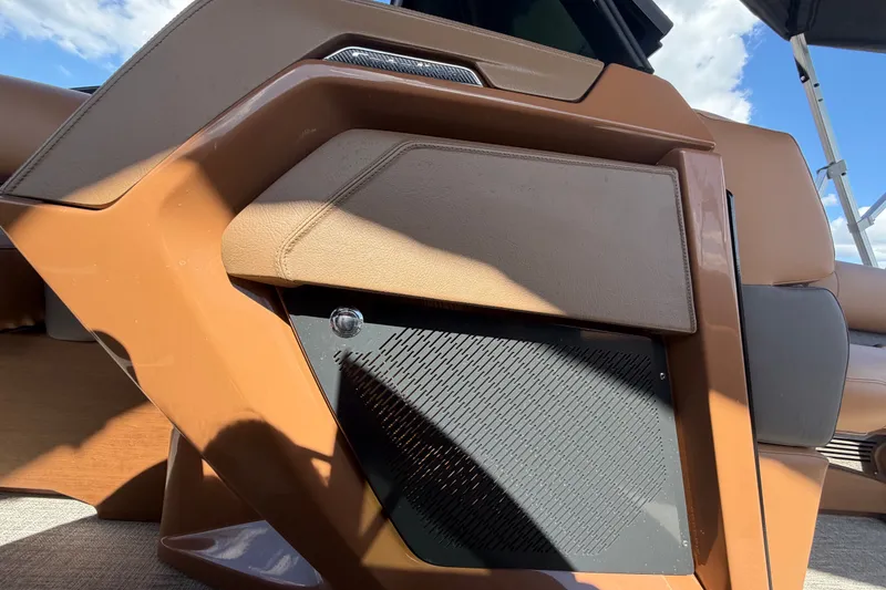Slide: The Image of 2025 Avalon Excalibur LTD Quad Lounge interior detail with brown and beige accents. - 52