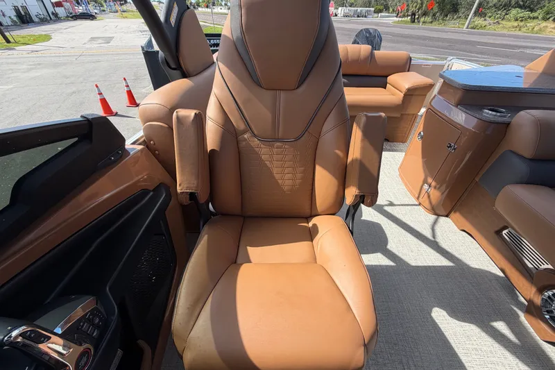 Slide: The Image of Luxurious brown leather seating in 2025 Avalon Excalibur LTD Quad Lounge boat. - 77