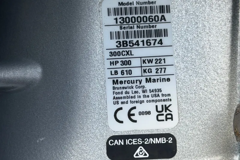 Slide: The Image of Label on Mercury Marine engine, model 300CXL, 300 HP, assembled in the USA. - 99