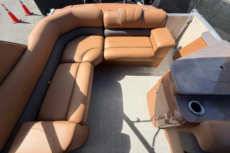 Slide: The Image of Luxurious seating on 2025 Avalon Excalibur LTD Quad Lounge Windshield boat interior. - 79