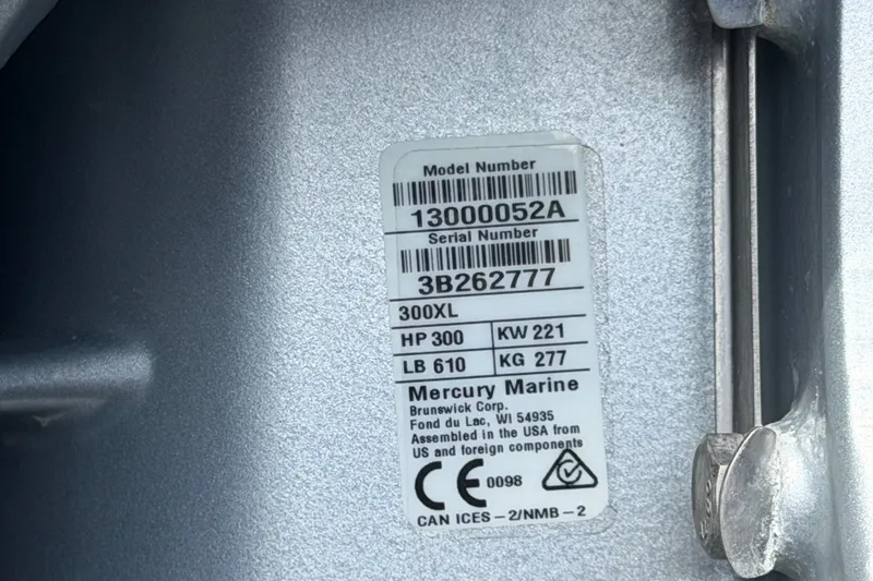 Slide: The Image of Label on 2025 Avalon Excalibur LTD, showing model and serial numbers, Mercury Marine details. - 98