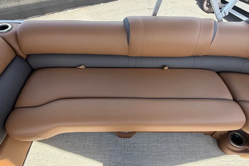 Slide: The Image of Luxurious brown seating on 2025 Avalon Excalibur LTD Quad Lounge boat. - 56
