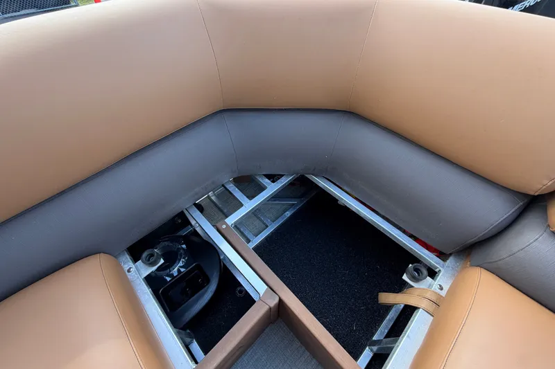 Slide: The Image of Avalon Excalibur LTD Quad Lounge seating with storage, 2025 model, brown and gray upholstery. - 85