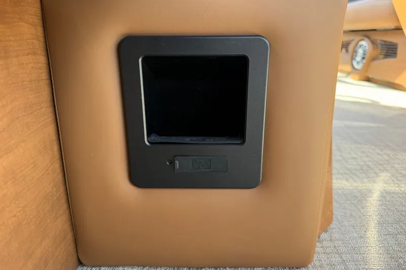 Slide: The Image of 2025 Avalon Excalibur LTD Quad Lounge interior detail with brown upholstery and black compartment. - 71