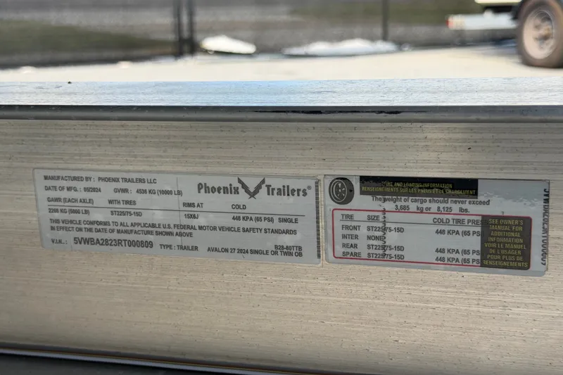 Slide: The Image of Label on Phoenix Trailers, detailing specifications and tire information for Avalon 2025 model. - 100