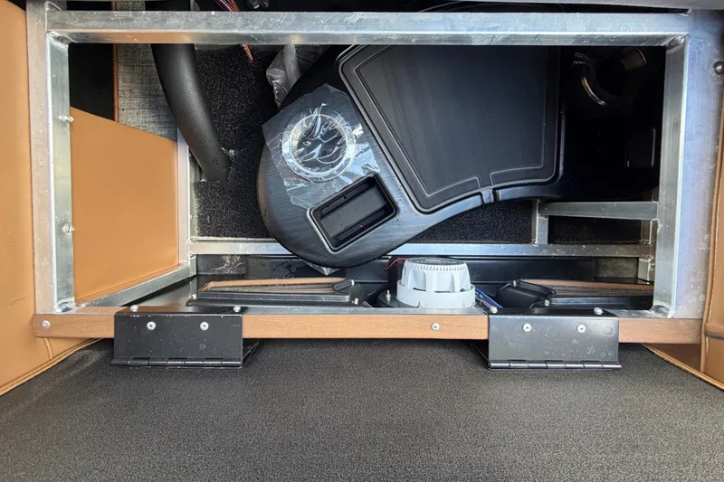 Slide: The Image of Storage compartment of 2025 Avalon Excalibur LTD Quad Lounge boat, showcasing interior details. - 83