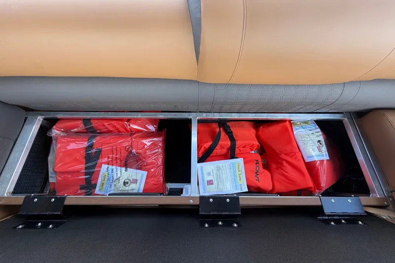 Slide: The Image of Life jackets stored in a compartment on a boat. - 57
