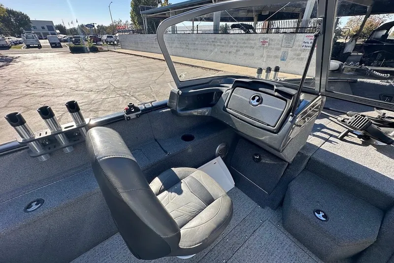 Slide: The Image of 2020 Tracker Pro Guide V-175 Combo boat interior with seating and rod holders. - 19