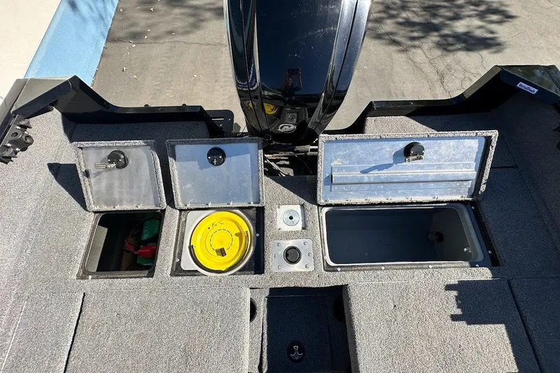 Slide: The Image of 2020 Tracker Pro Guide V-175 Combo boat storage compartments and engine view. - 15
