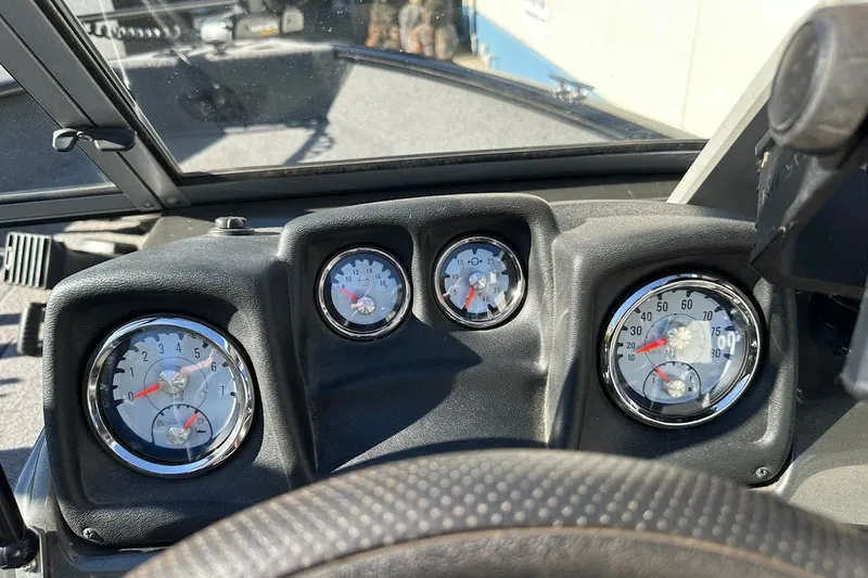 Slide: The Image of Dashboard of 2020 Tracker Pro Guide V-175 Combo boat with gauges and steering wheel. - 22