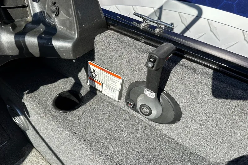 Slide: The Image of 2020 Tracker Pro Guide V-175 Combo boat interior with control lever and warning label. - 26