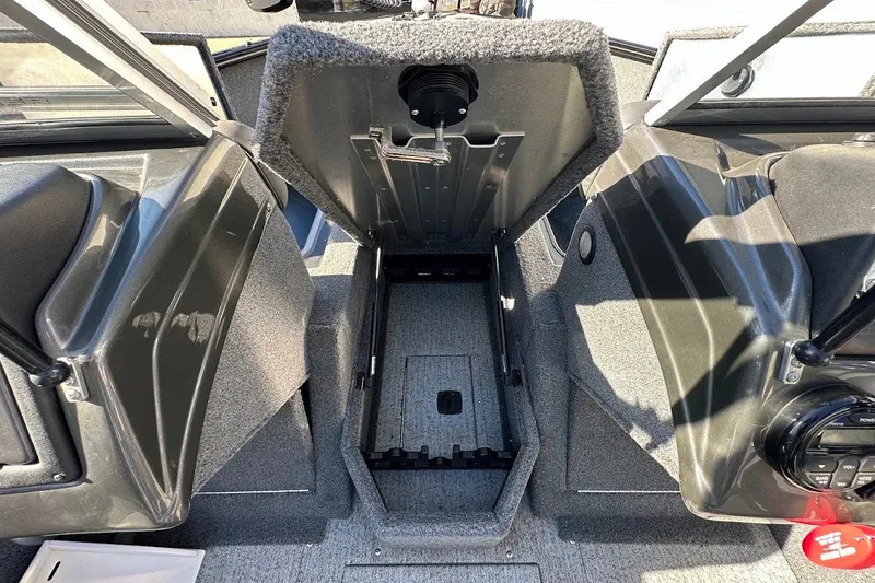 Slide: The Image of 2020 Tracker Pro Guide V-175 Combo interior with open storage compartment. - 37