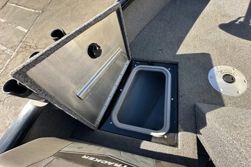 Slide: The Image of Open storage compartment on 2020 Tracker Pro Guide V-175 Combo boat. - 40