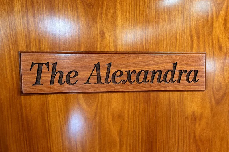 Slide: The Image of Wooden nameplate "The Alexandra" on Beneteau Oceanis 473, 2005 model. - 43