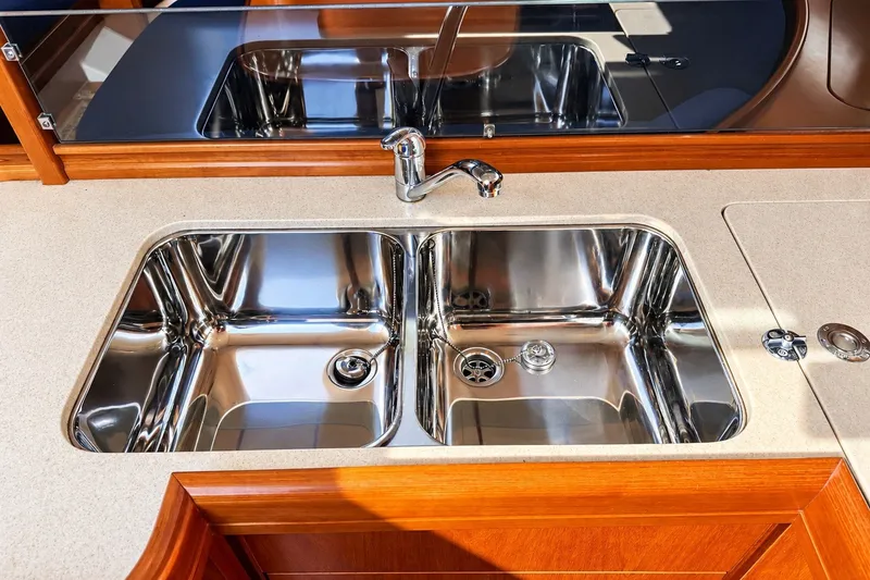Slide: The Image of Stainless steel double sink in 2005 Beneteau Oceanis 473 yacht kitchen. - 17