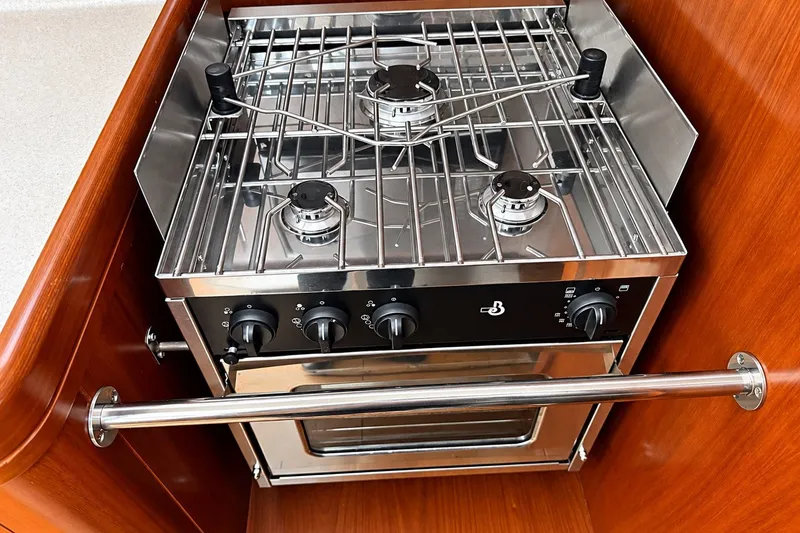 Slide: The Image of Stainless steel stove and oven in 2005 Beneteau Oceanis 473 yacht galley. - 18