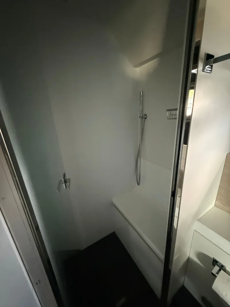 Slide: The Image of The shower in the 2019 Cranchi E 52S Evoluzione is sleek and minimalist. - 48