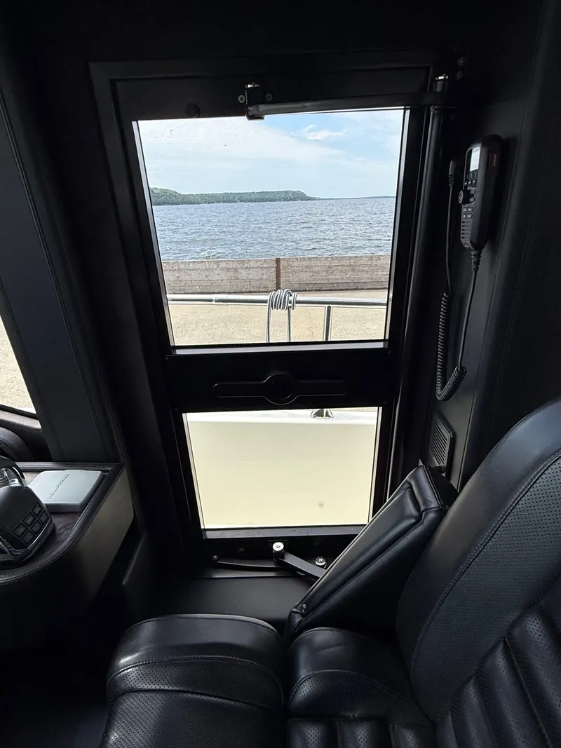 Slide: The Image of The 2019 Cranchi E 52S Evoluzione features a door with a view of the water. - 38