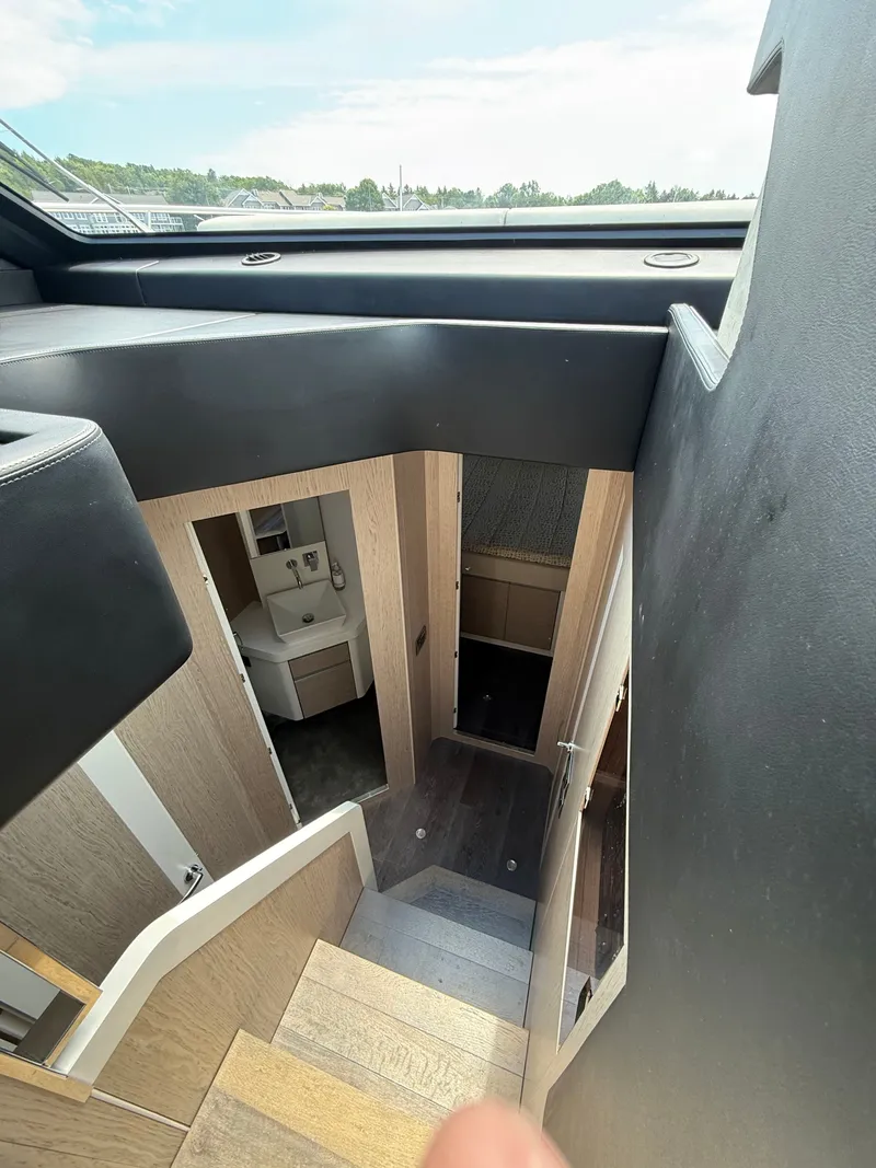 Slide: The Image of Interior view of the 2019 Cranchi E 52S Evoluzione with stairs and bathroom. - 40
