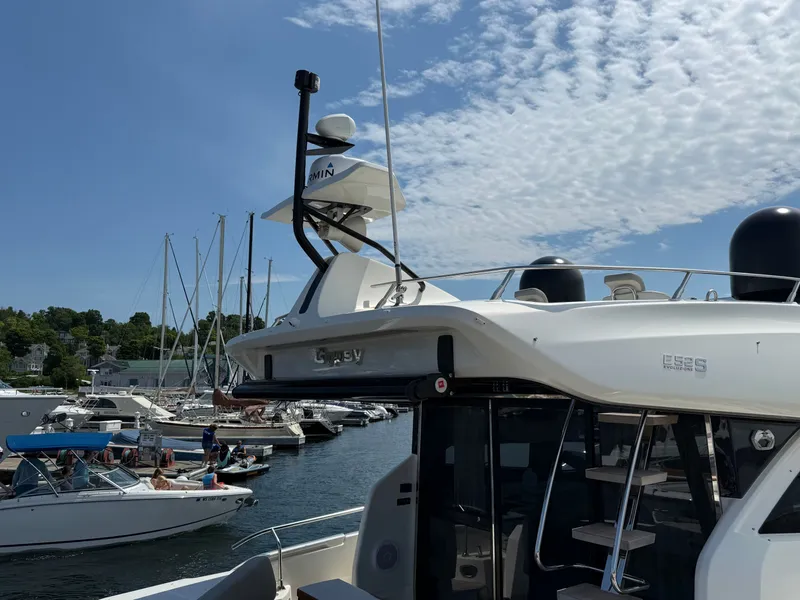 Slide: The Image of 2019 Cranchi E 52S Evoluzione docked with other boats in the background. - 13