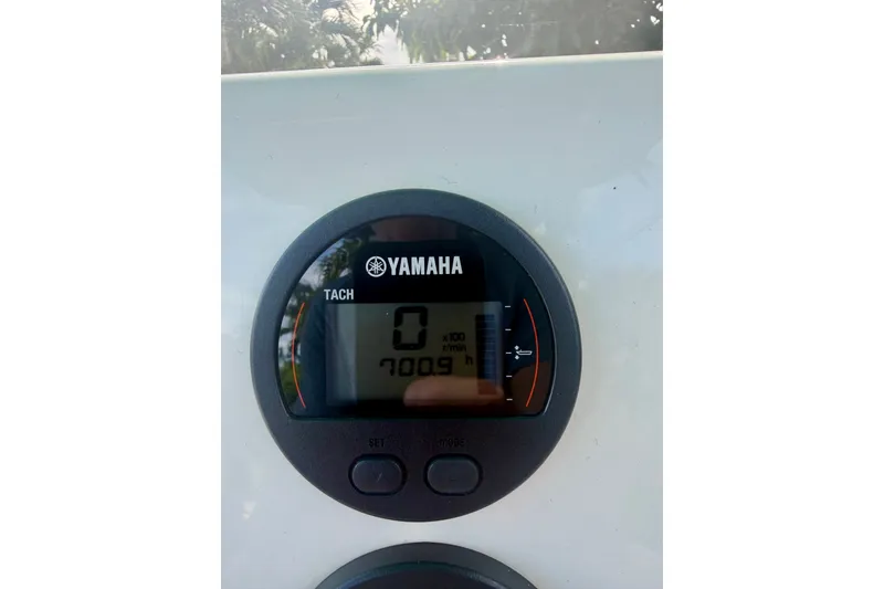Slide: The Image of Yamaha tachometer display on 2023 Key West 239 FS boat, showing 700.9 hours. - 14