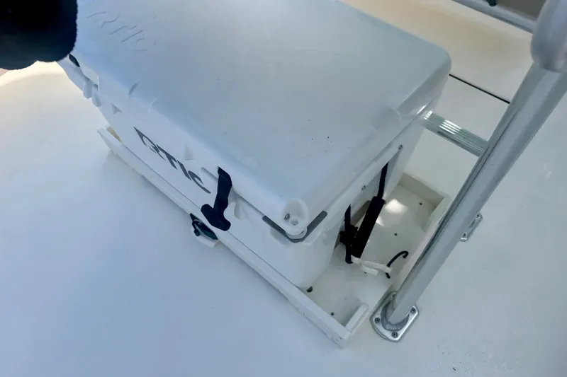Slide: The Image of White cooler secured on 2023 Key West 239 FS boat deck with metal railing. - 16