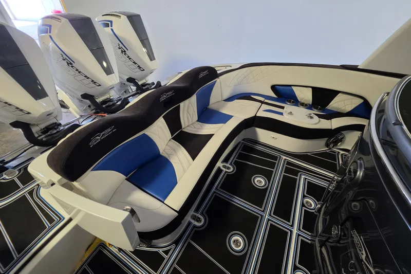 Slide: The Image of Luxury seating and powerful engines on a 2021 MTI 42 v boat. - 12