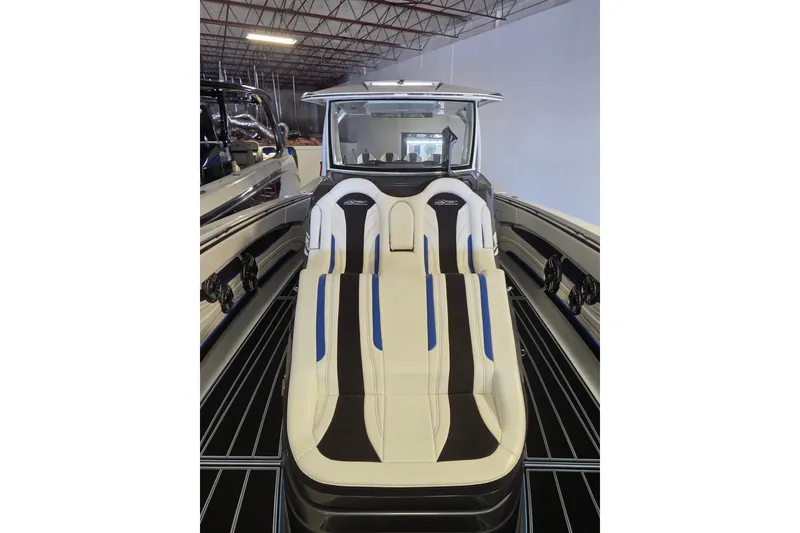 Slide: The Image of 2021 MTI 42 v boat interior with sleek seating and modern design. - 15