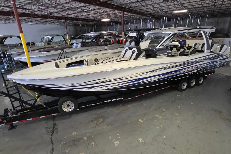 The Image of A 2021 MTI 42 v boat on a trailer in a warehouse. - 0