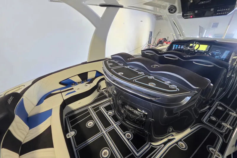 Slide: The Image of Luxurious interior of 2021 MTI 42 v boat with sleek design and advanced dashboard. - 8