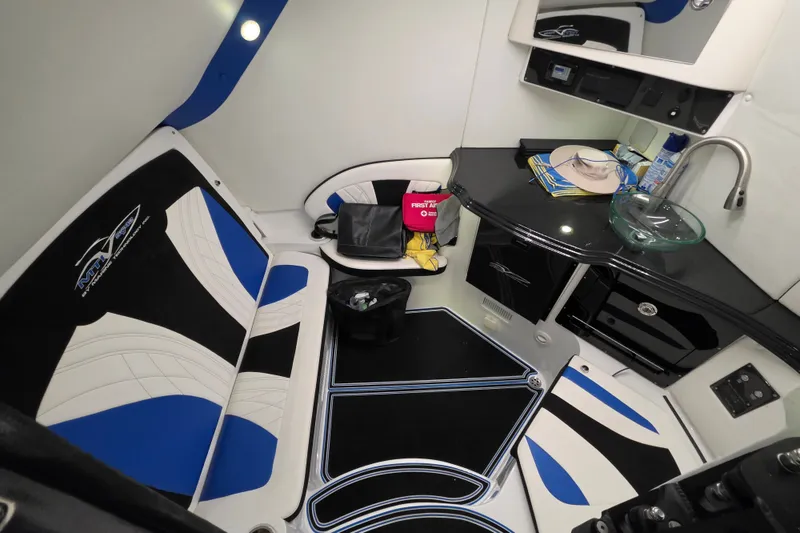 Slide: The Image of Luxurious interior of a 2021 MTI 42 v boat featuring sleek seating and modern amenities. - 19