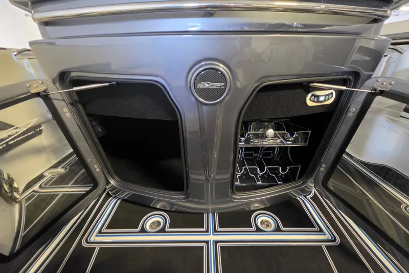 Slide: The Image of Open storage compartments on a 2021 MTI 42 v boat, featuring sleek design and modern amenities. - 11
