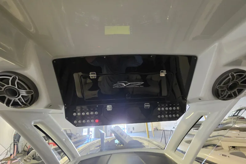 Slide: The Image of Interior view of a 2021 MTI 42 v boat with speakers and control panel. - 3