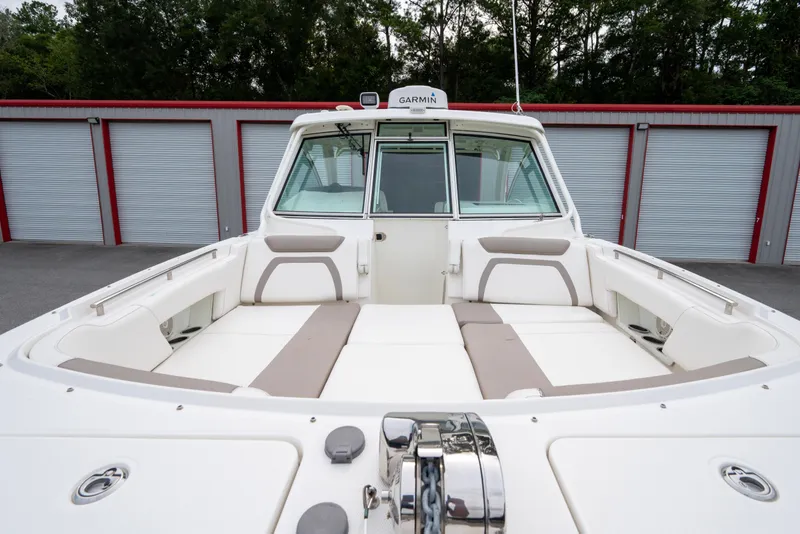 Slide: The Image of 2020 World Cat 320 DC boat with spacious seating and modern design. - 6