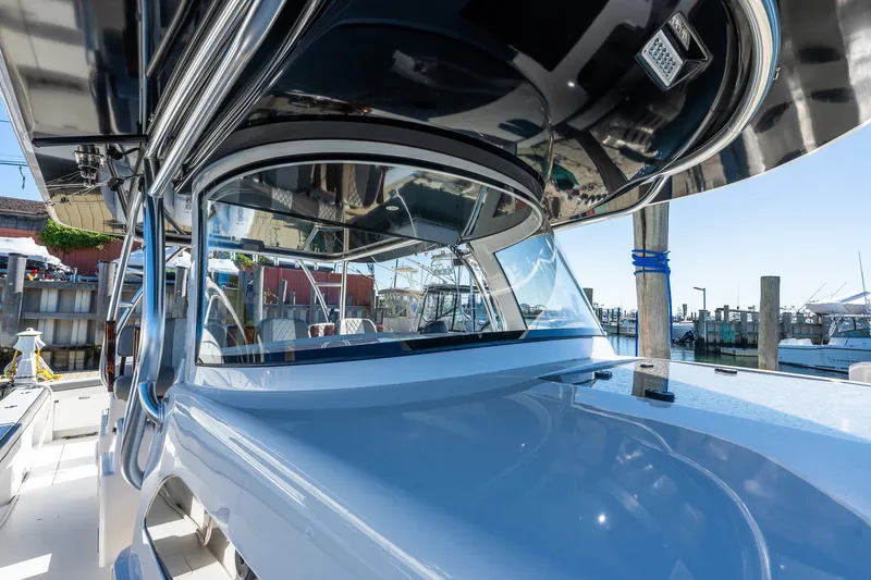 Slide: The Image of 2022 Valhalla V-46 boat docked, showcasing sleek design and modern features. - 36