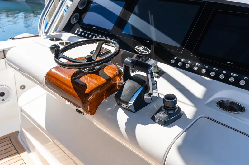 Slide: The Image of 2022 Valhalla V-46 helm with steering wheel, throttle controls, and navigation screens. - 29