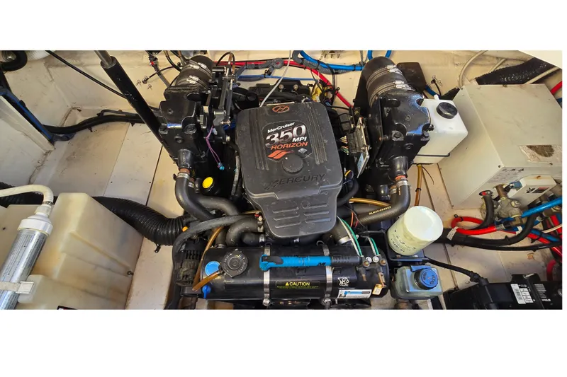 Slide: The Image of Engine compartment of a 2005 Sea Ray Sundancer 260 with a Mercury 350 MPI Horizon engine. - 27