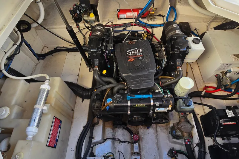 Slide: The Image of Engine compartment of a 2005 Sea Ray Sundancer 260 with MerCruiser 350 MPI Horizon engine. - 23