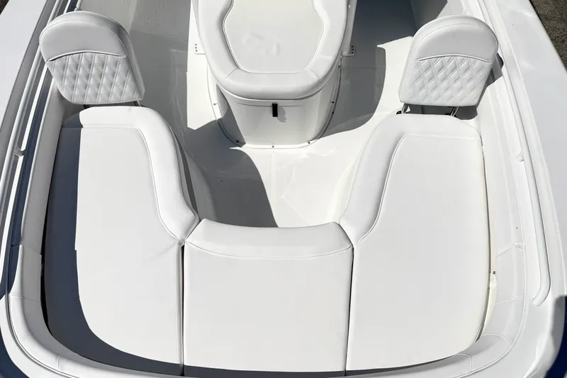Slide: The Image of Luxurious seating on 2027 Sea Hunt BX28 boat, featuring white cushioned upholstery. - 26