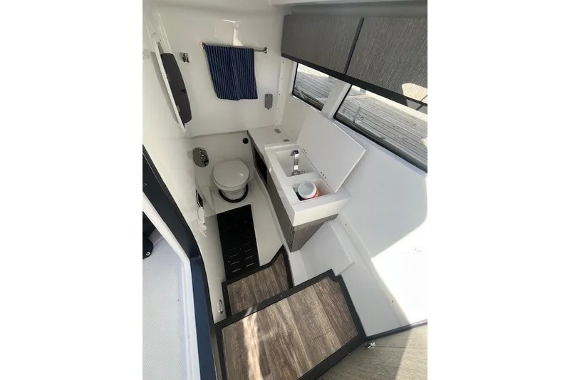 Slide: The Image of 2024 Monterey 378SS Super Sport boat interior with modern bathroom amenities. - 14