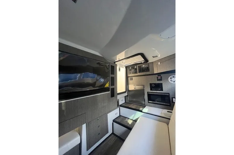 Slide: The Image of 2024 Monterey 378SS Super Sport cabin interior with modern amenities and sleek design. - 17
