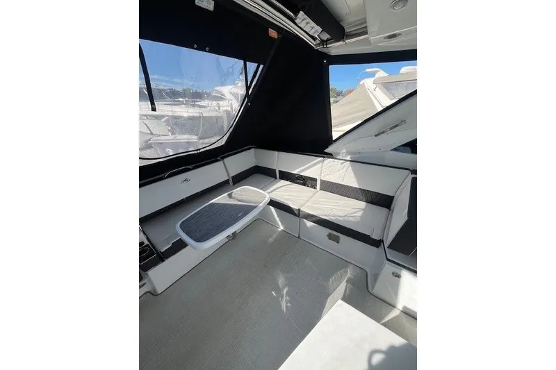 Slide: The Image of 2024 Monterey 378SS Super Sport boat interior with sleek seating and modern design. - 5