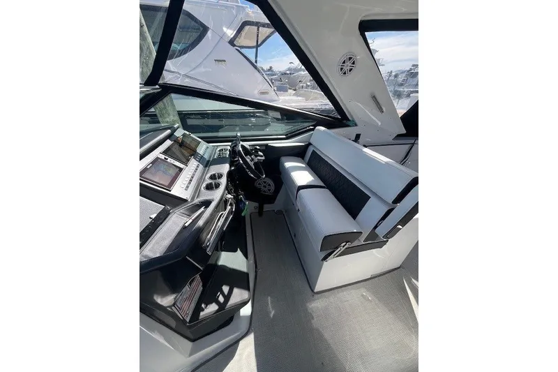 Slide: The Image of 2024 Monterey 378SS Super Sport cockpit with modern controls and seating. - 9
