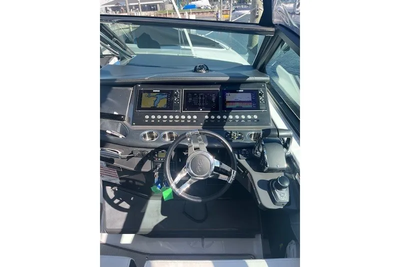 Slide: The Image of 2024 Monterey 378SS Super Sport dashboard with advanced navigation controls and sleek design. - 19